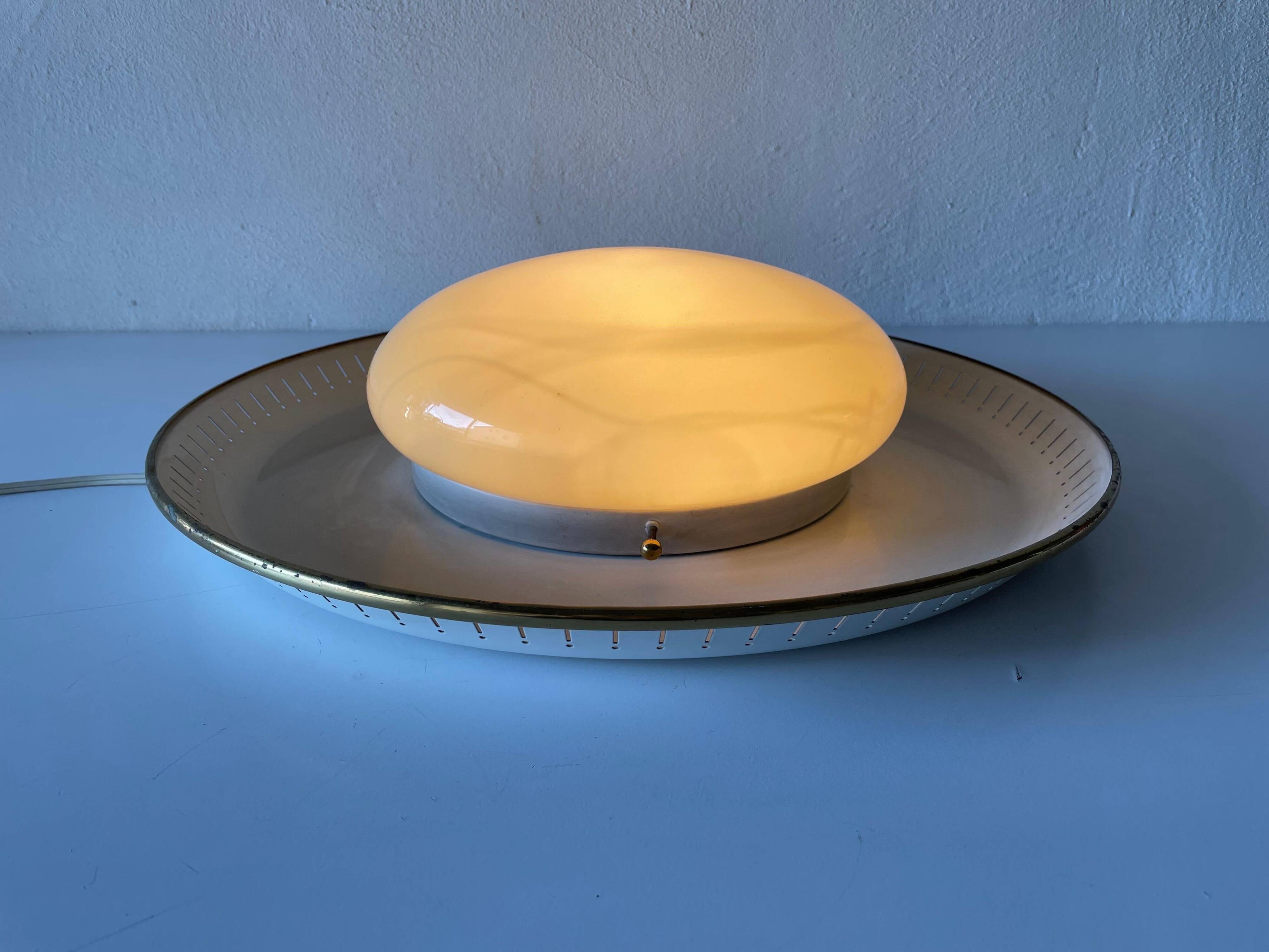 Brass disc and glass clip lamp from the mid-century by Hillebrand, 1950s, Germany.