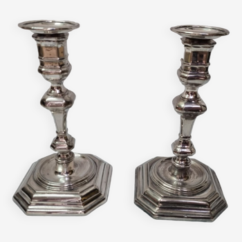 Pair of silver metal candlesticks