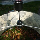 Black cylindrical blind suspension with silver moist print