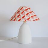 Small lamp with matte finish ceramic base and printed coolie lampshade