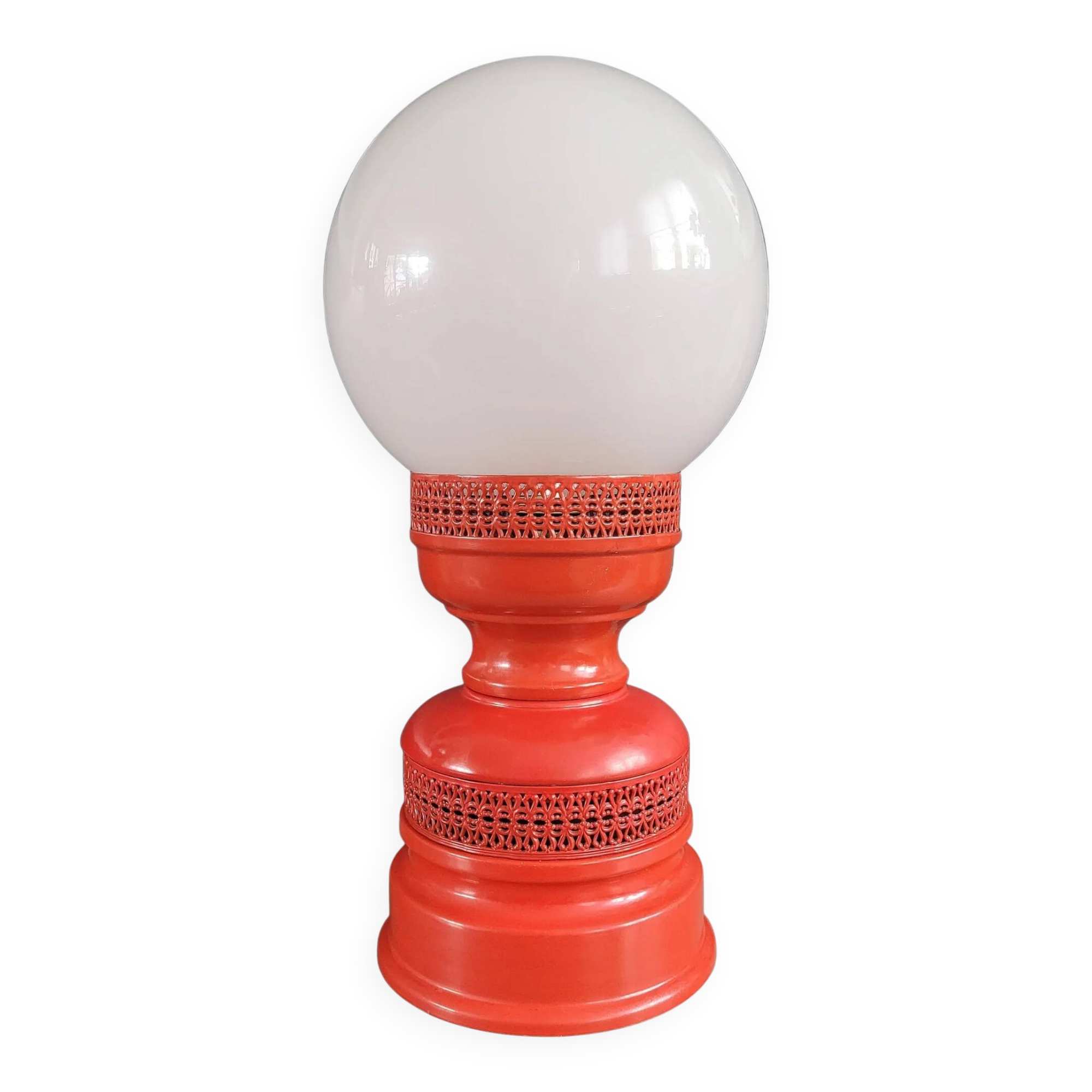 Vintage globe lamp with a metal base, perforated and lacquered in red.