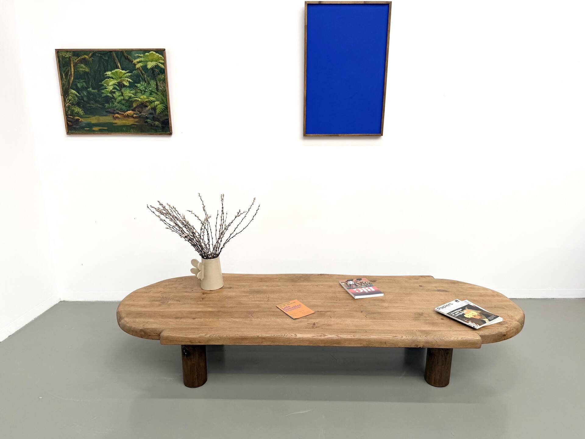 XXL oval coffee table in solid oak, cylindrical base, 1950s.