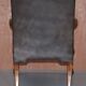 Gainsborough armchair George II leather Chesterfield hand-carved with claw and ball feet.