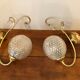 Duo of brass and glass wall lamps