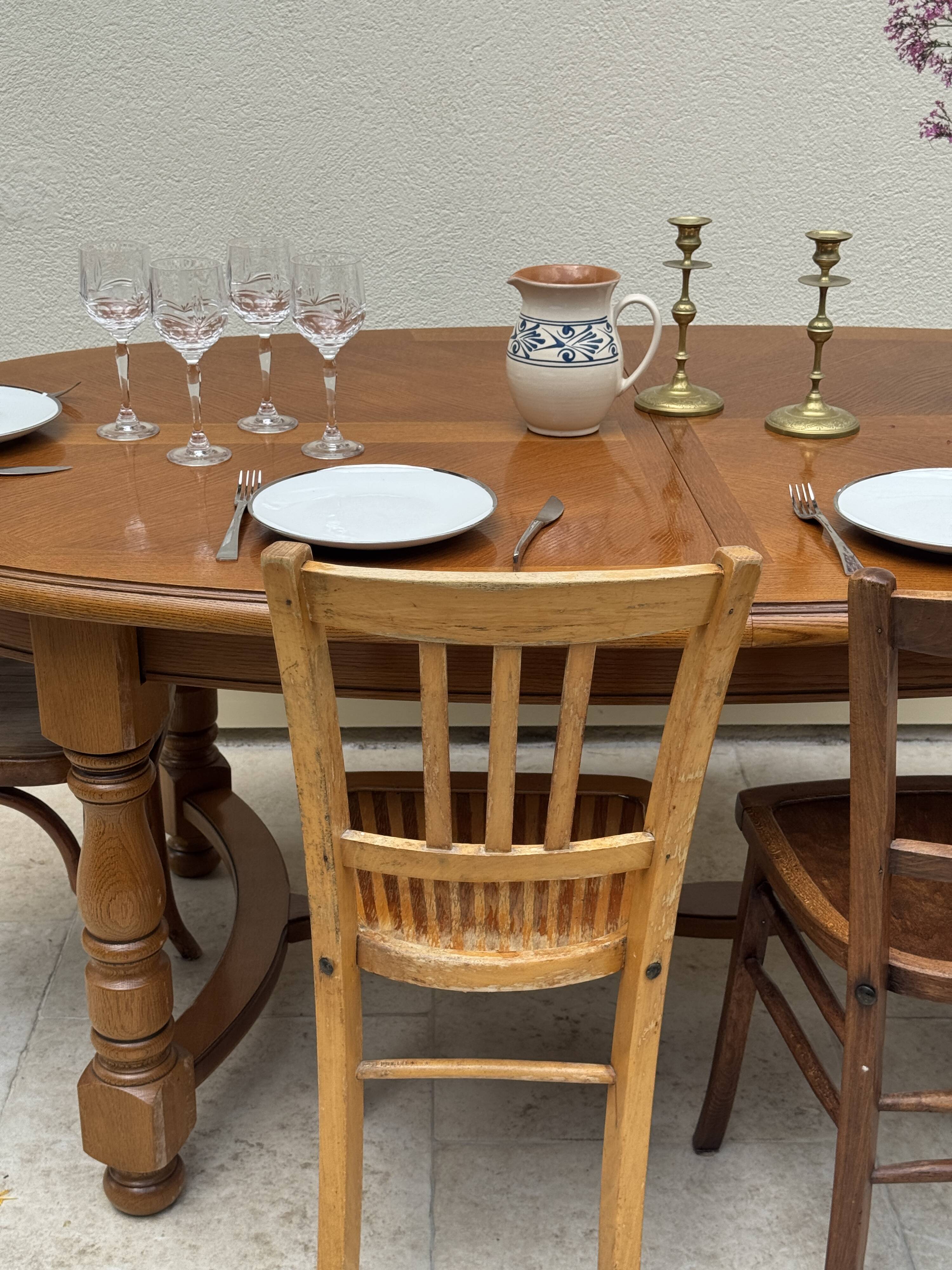 Oak dining table, oval living room table with two extensions.