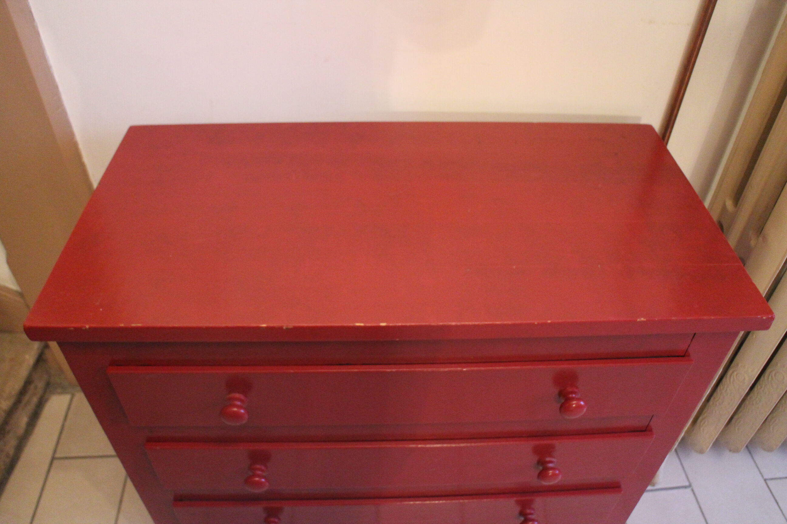 Red chest of drawers