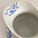 Antique chubby ironstone jug with floral and bird decoration