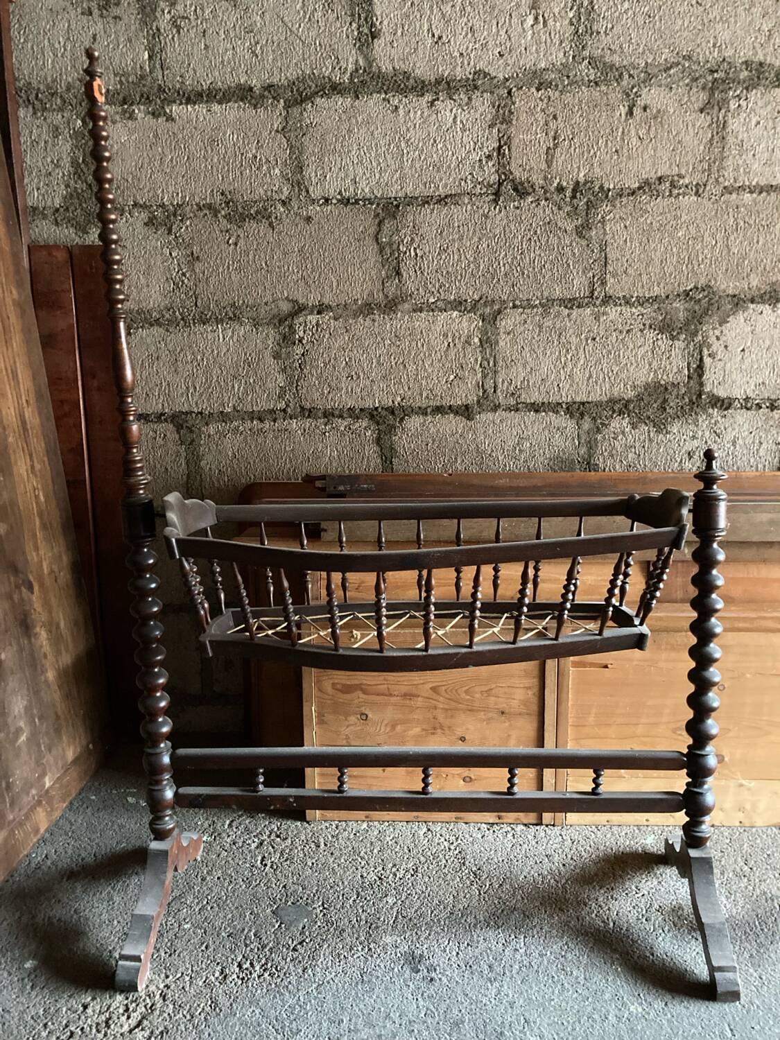 Antique turned wooden cradle