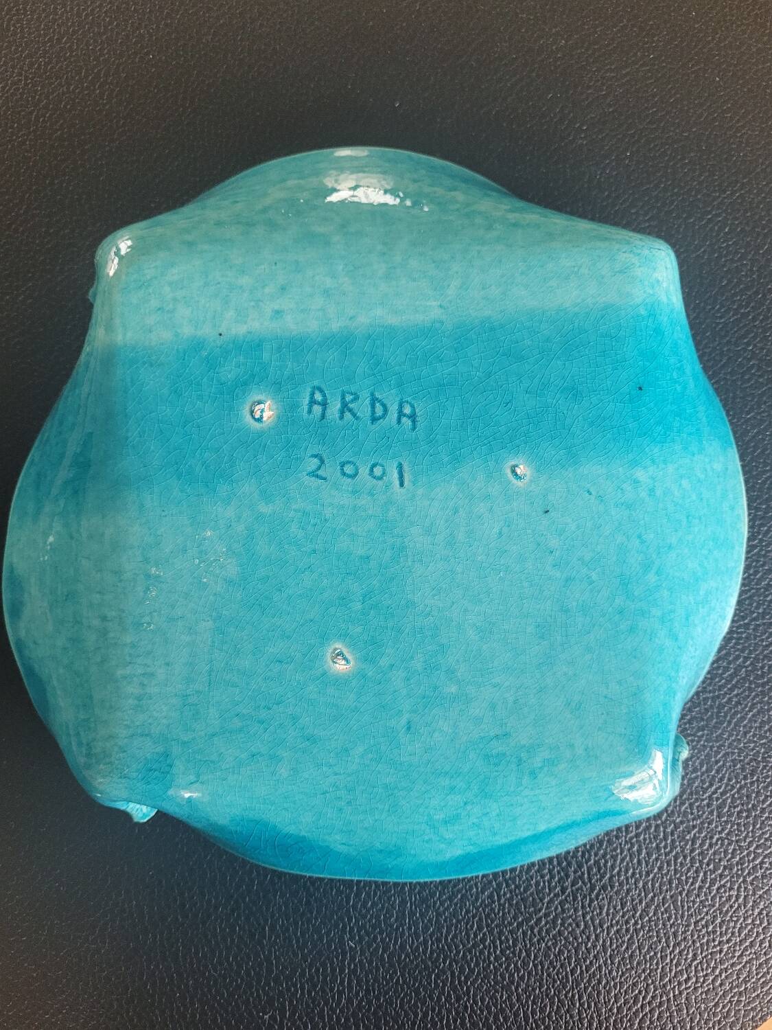 Signed turquoise enameled ceramic pocket tray