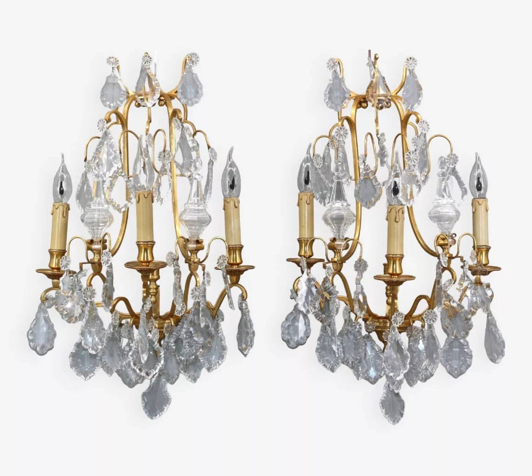 Pair of Louis XVI style gilded bronze & bohemian crystal sconces