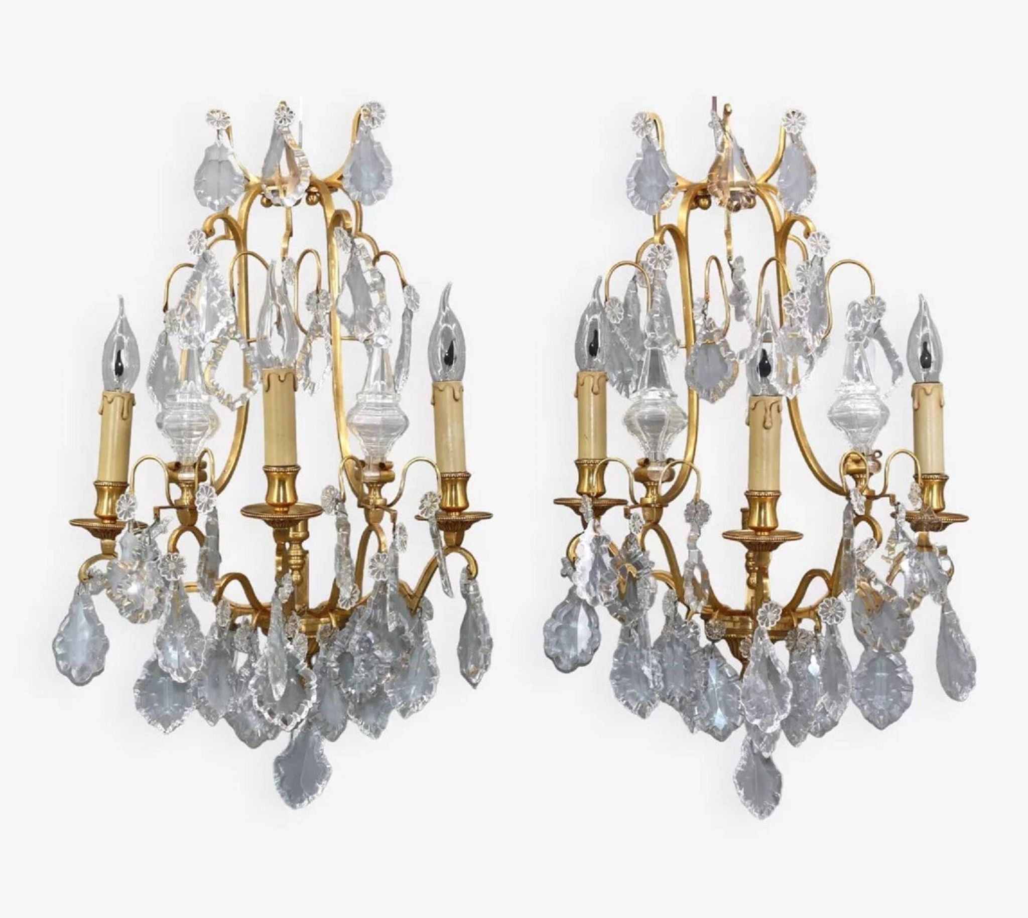Pair of Louis XVI style gilded bronze & bohemian crystal sconces