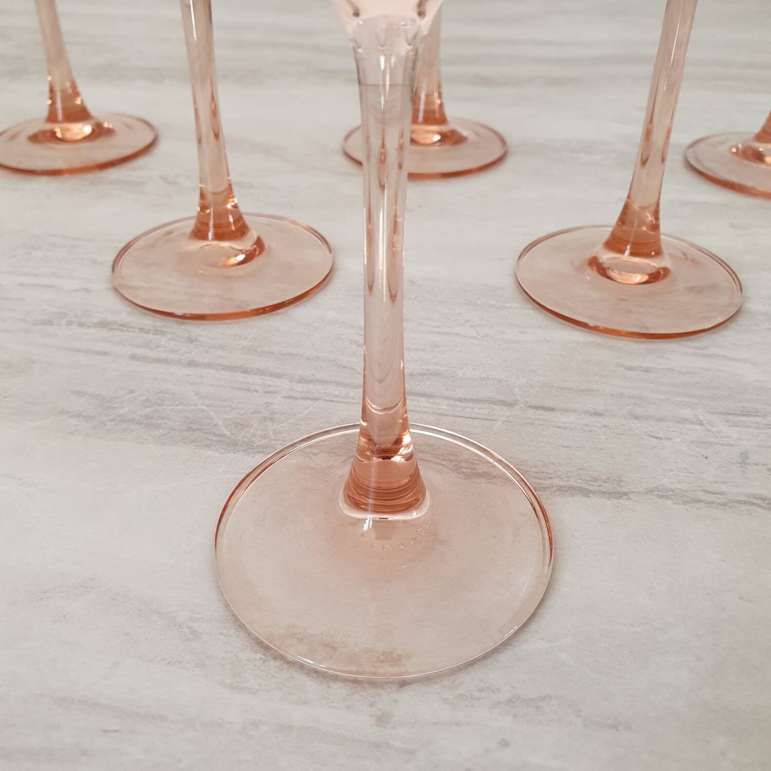 6 champagne flutes with pink stems