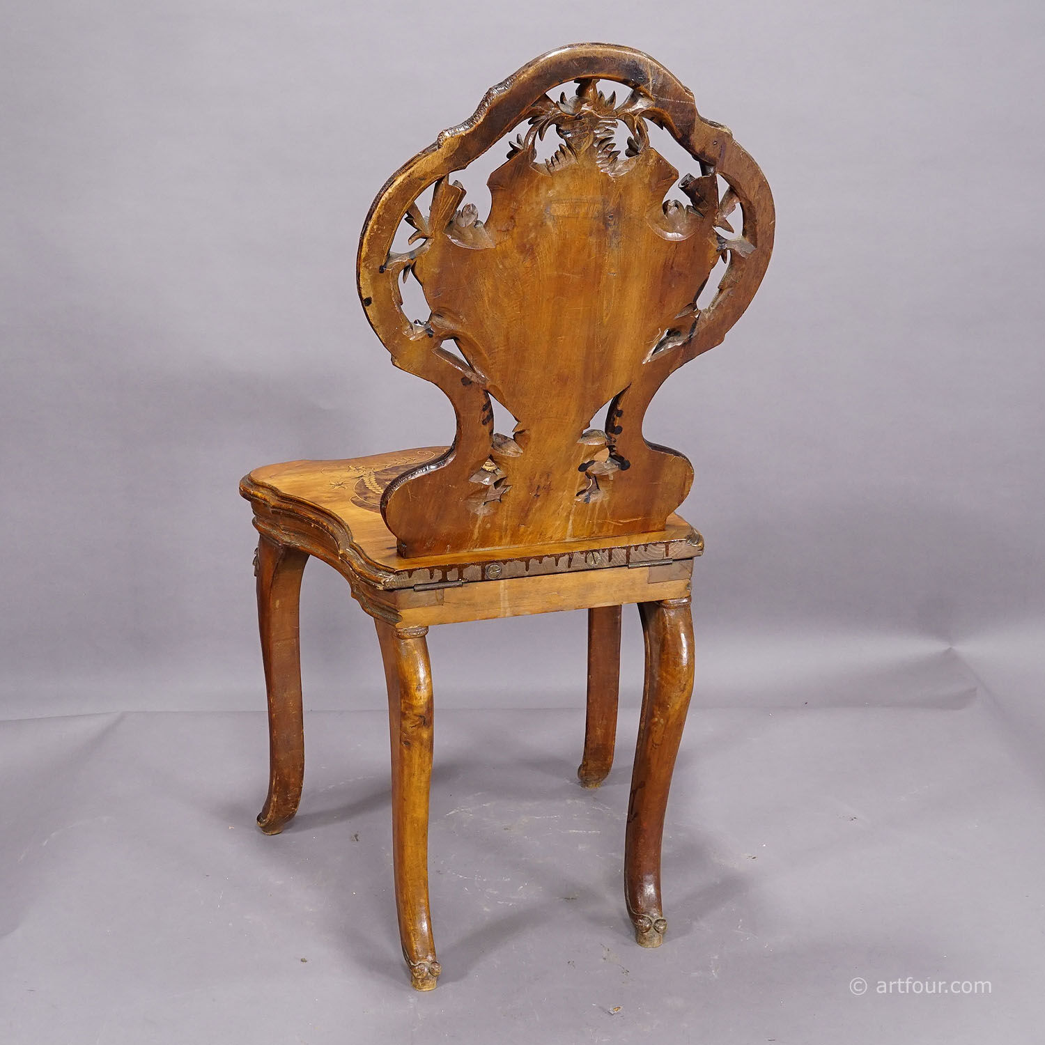 Pair of walnut chairs with Edelweiss marquetry, Brienz Switzerland 1900