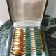 12 teaspoons - gold metal - Shell decoration - in their case
