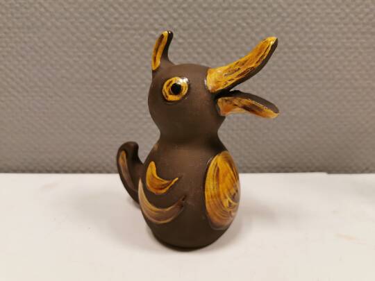 Old ceramic piggy bank. shaped like a duck from hegnetslund denmark