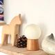 Pair of lamps with wooden base and glass globe, 1970s