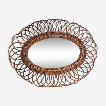 Oval mirror in natural wicker varnished 50x62cm
