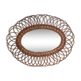 Oval mirror in natural wicker varnished 50x62cm