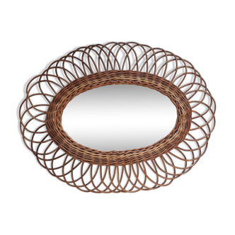 Oval mirror in natural wicker varnished 50x62cm
