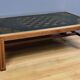 Large chessboard coffee table in mahogany, Jansen style – 2nd half of the 20th century.