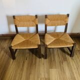 Pair of low wooden and straw armchairs