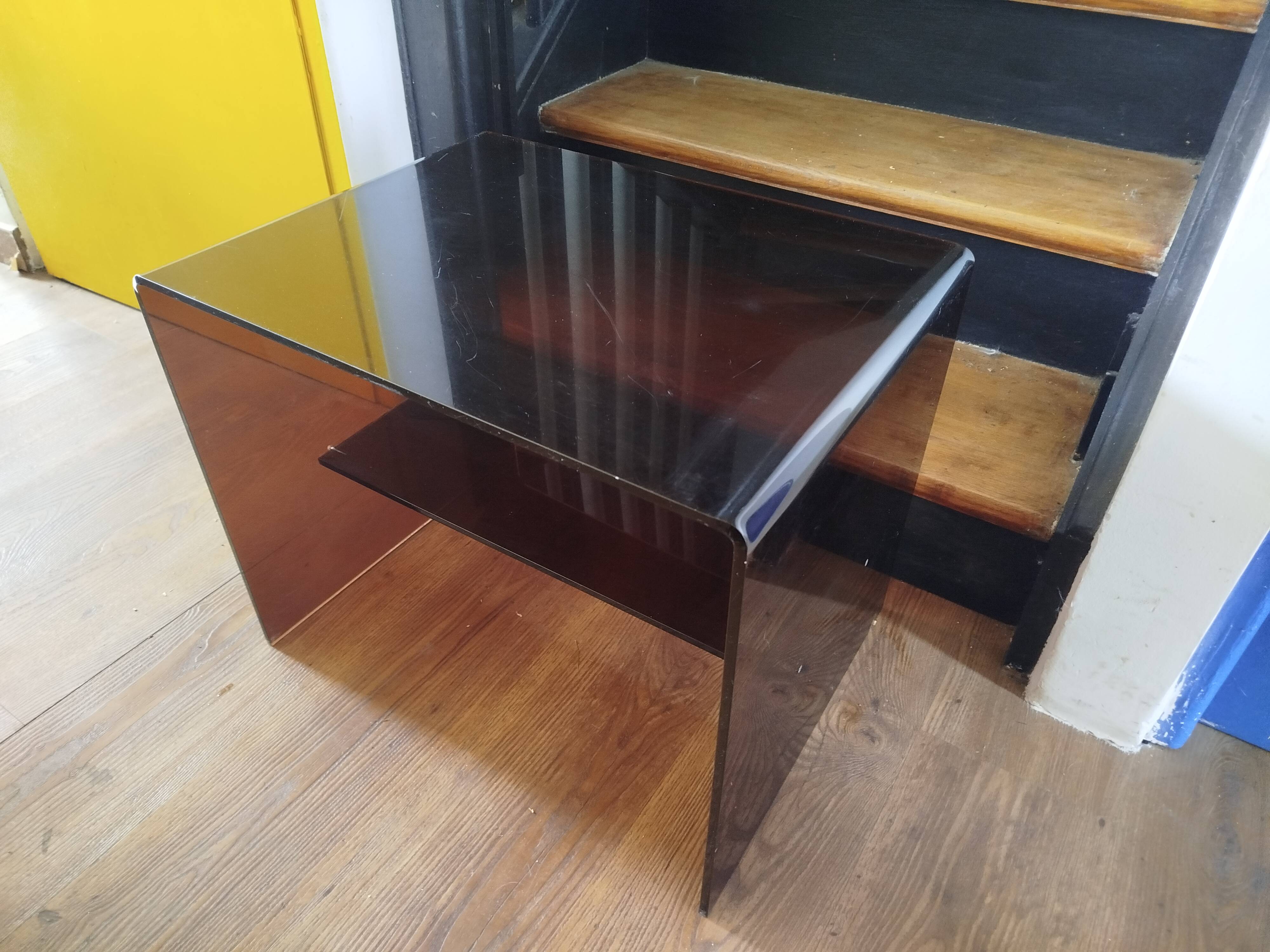Coffee table / accent piece by Michel Dumas in smoked plexiglass – year