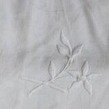 2 Pillowcases with flower decoration and satin stitch surround.