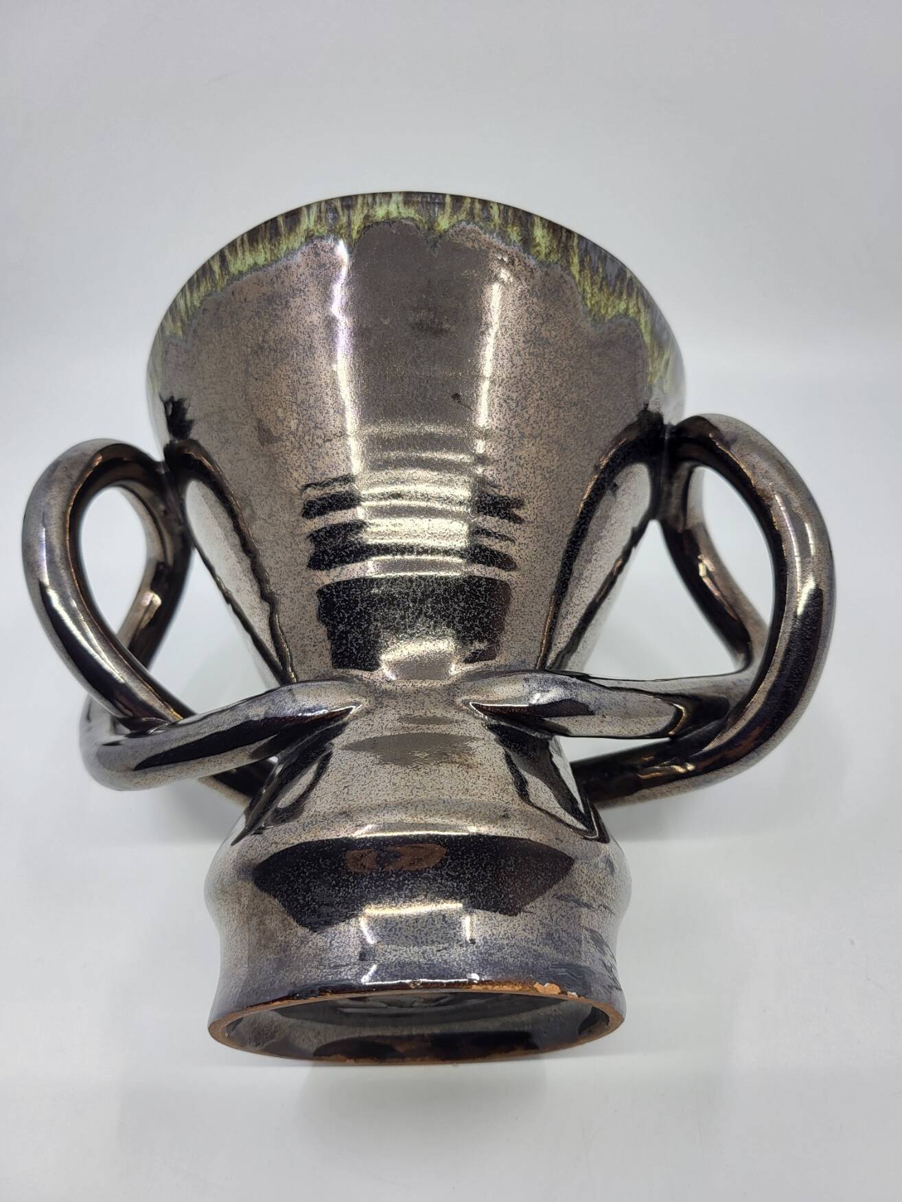 Jean Austruy ear vase in metallic black ceramic, France 1950.