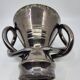 Jean Austruy ear vase in metallic black ceramic, France 1950.
