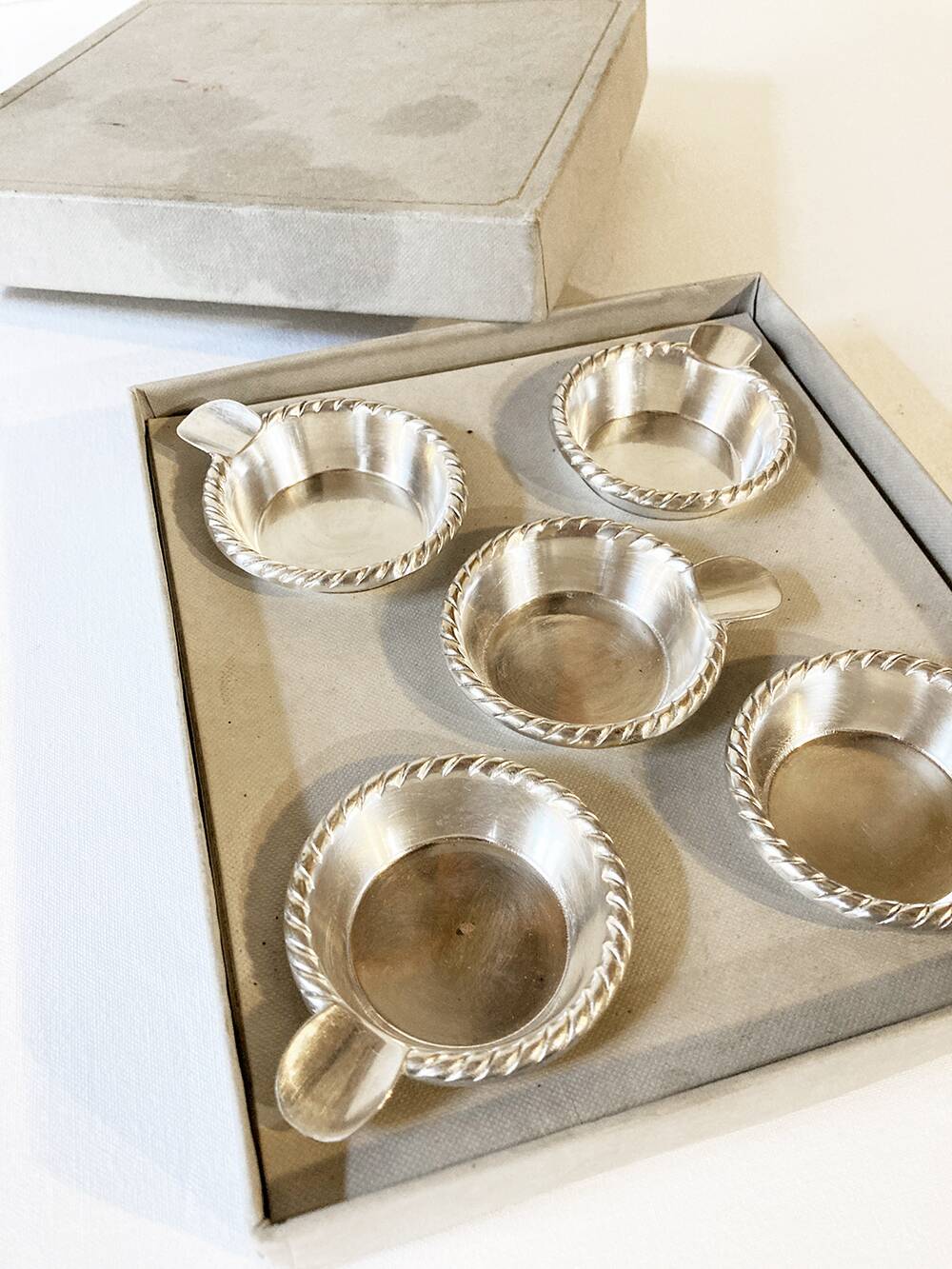 Individual silver metal ashtrays