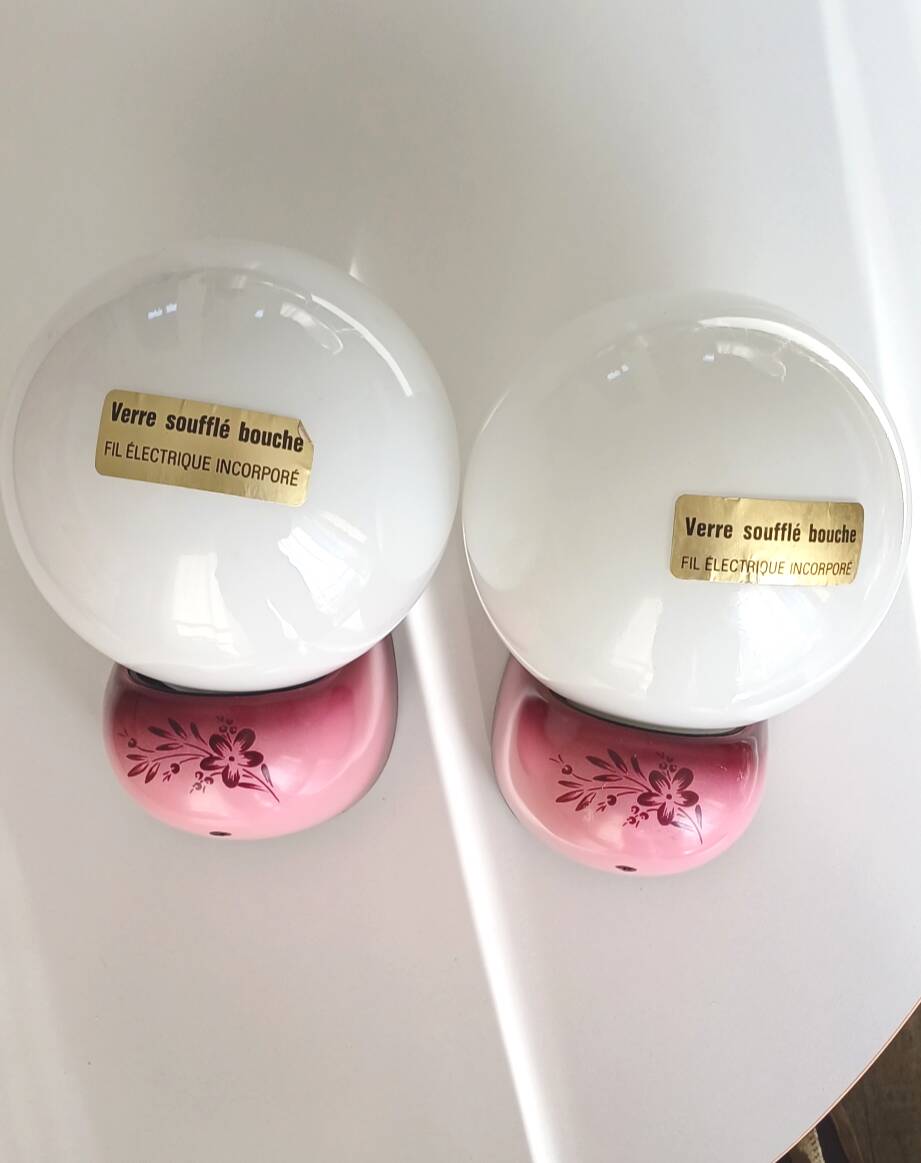 Pair of Tissot wall lights from the 70s with pink opaline glass in space age style.