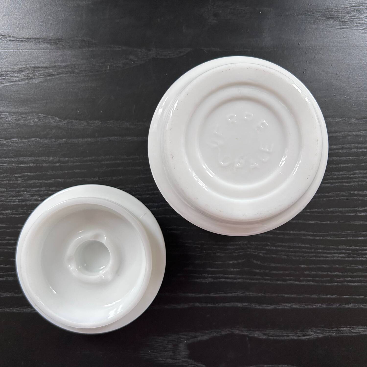 White pot with plant decoration