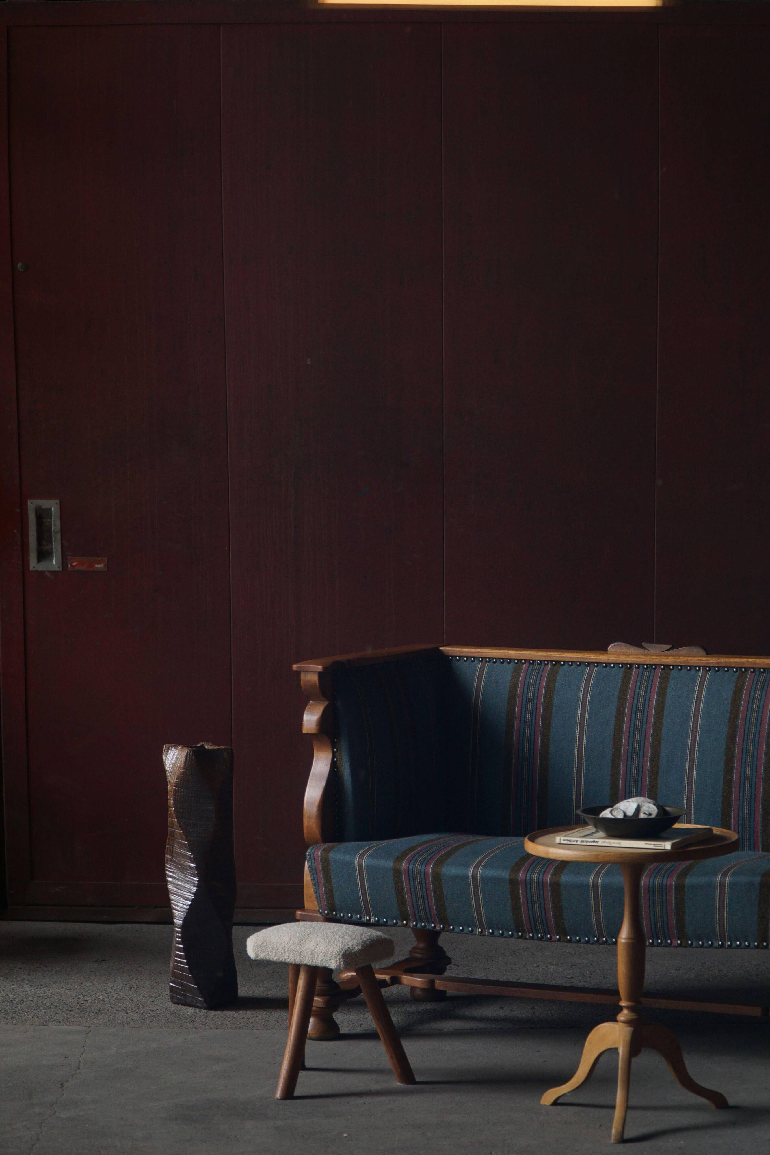 Oak canapé adorned with original upholstery, Nordic classicism, Sweden, 1930s.