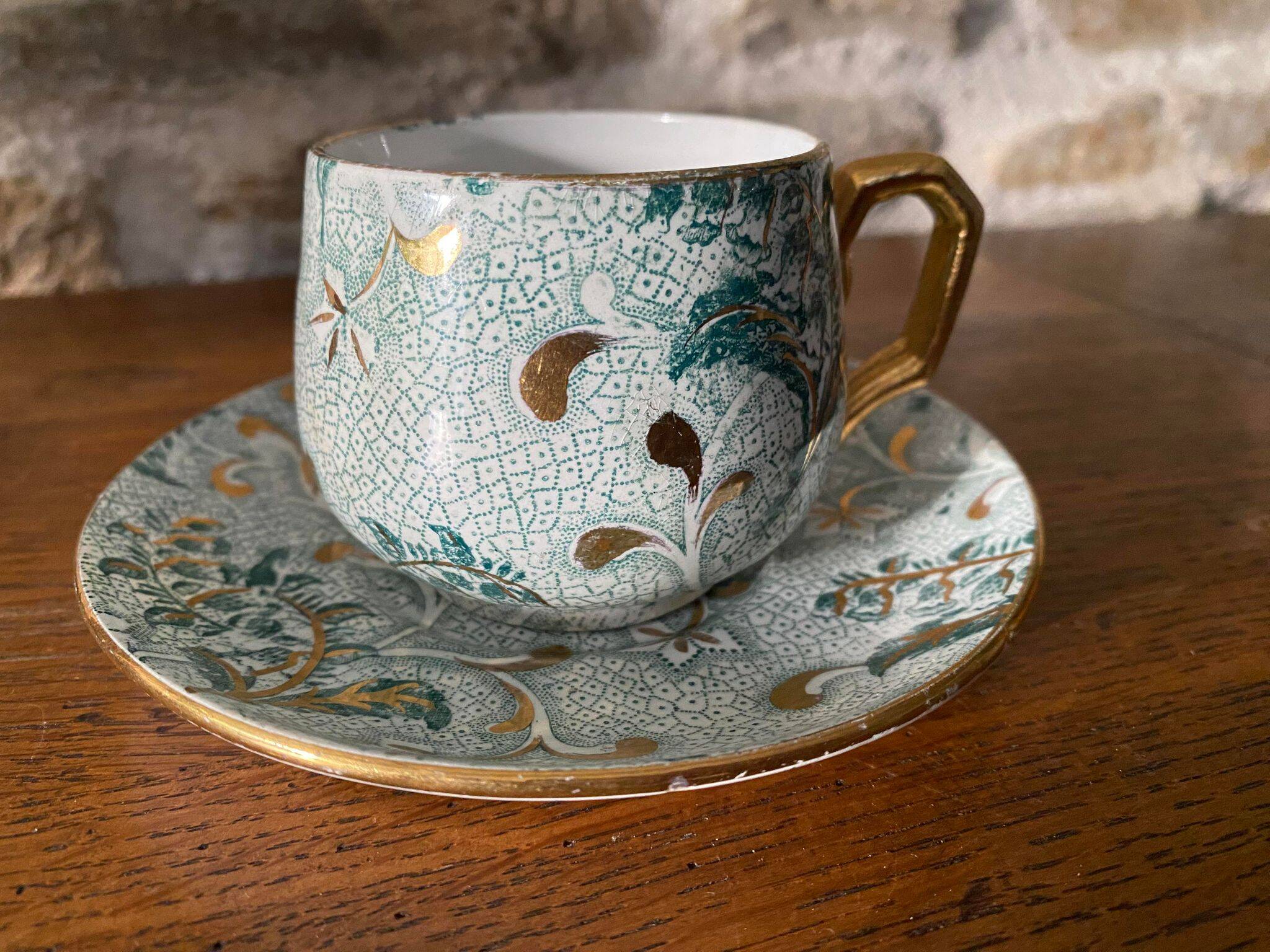 Creil et Montereau cup and saucer green and gold floral pattern