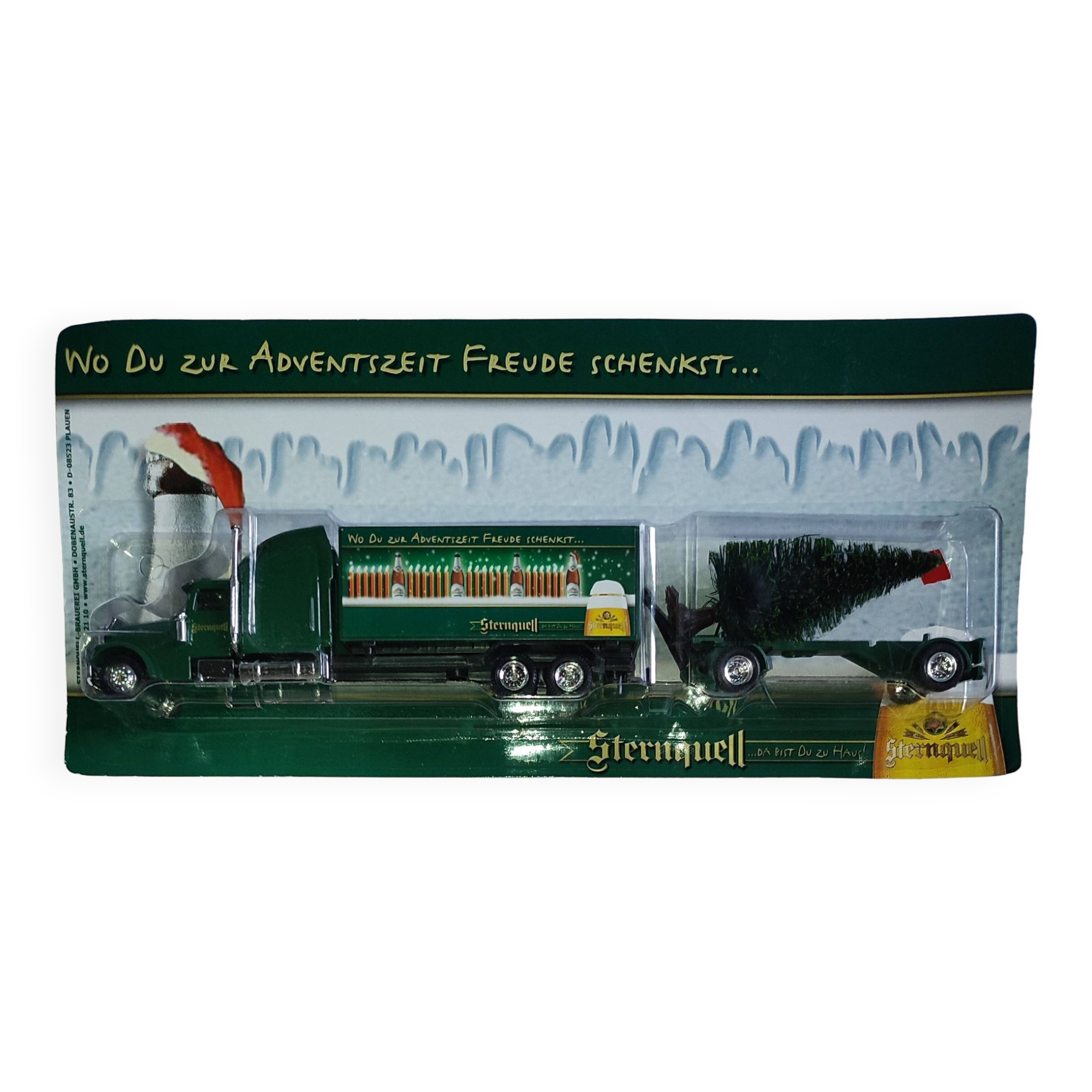 ''Freightliner'' semi-trailer + platform supporting 1 tree