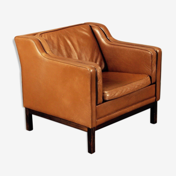 Armchair design Scandinavian brown leather.