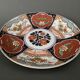 Large porcelain dish of Imari XIXth floral decoration