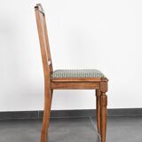 Set of 4 Art Deco chairs in carved wood.