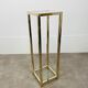 Gilded metal fifth wheel column and Hollywood Regency style glass 70s