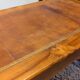Cherry wood desk with a leather top.