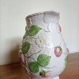 Barbotine pitcher with pastel flower decoration