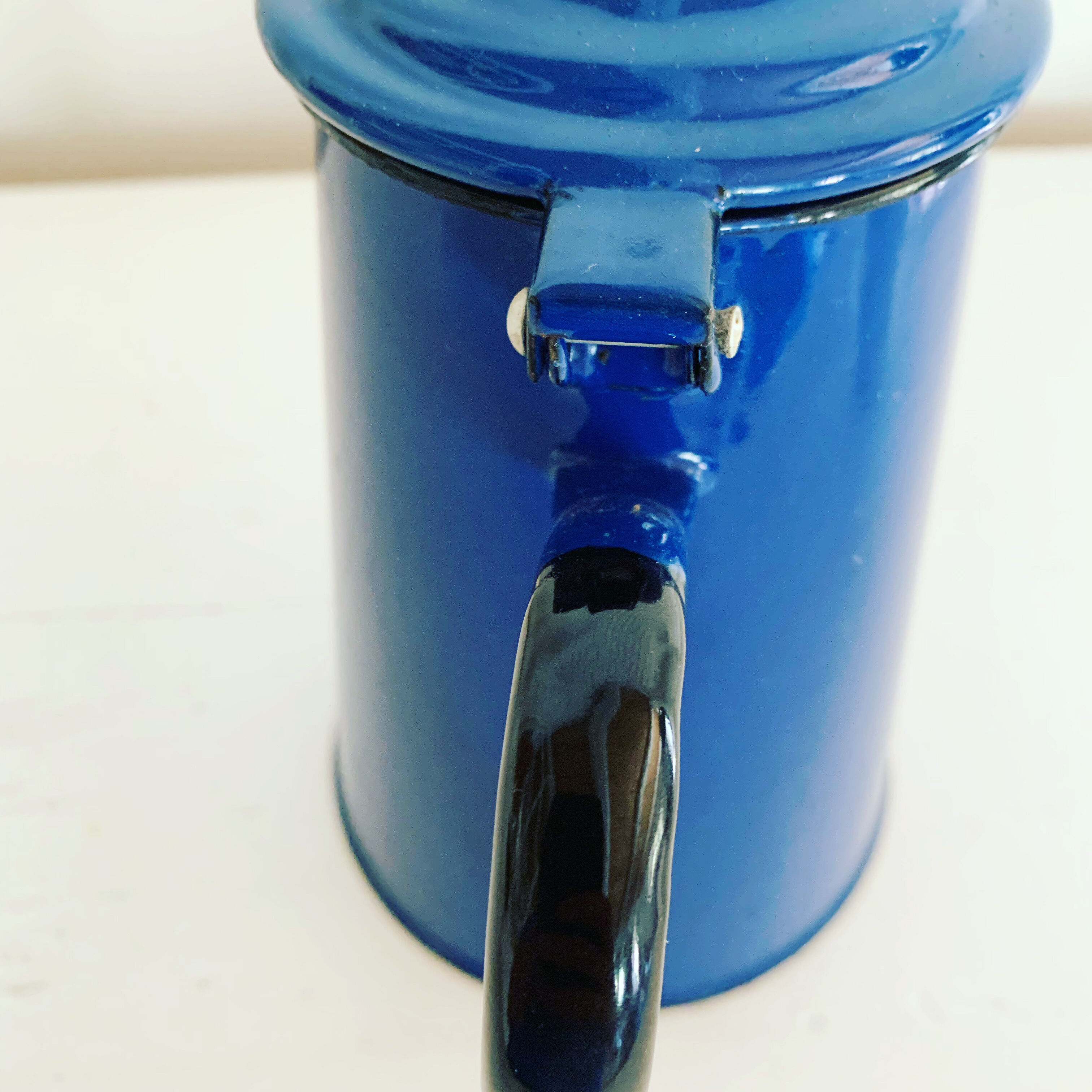 Vintage blue and black enamel coffee pot
