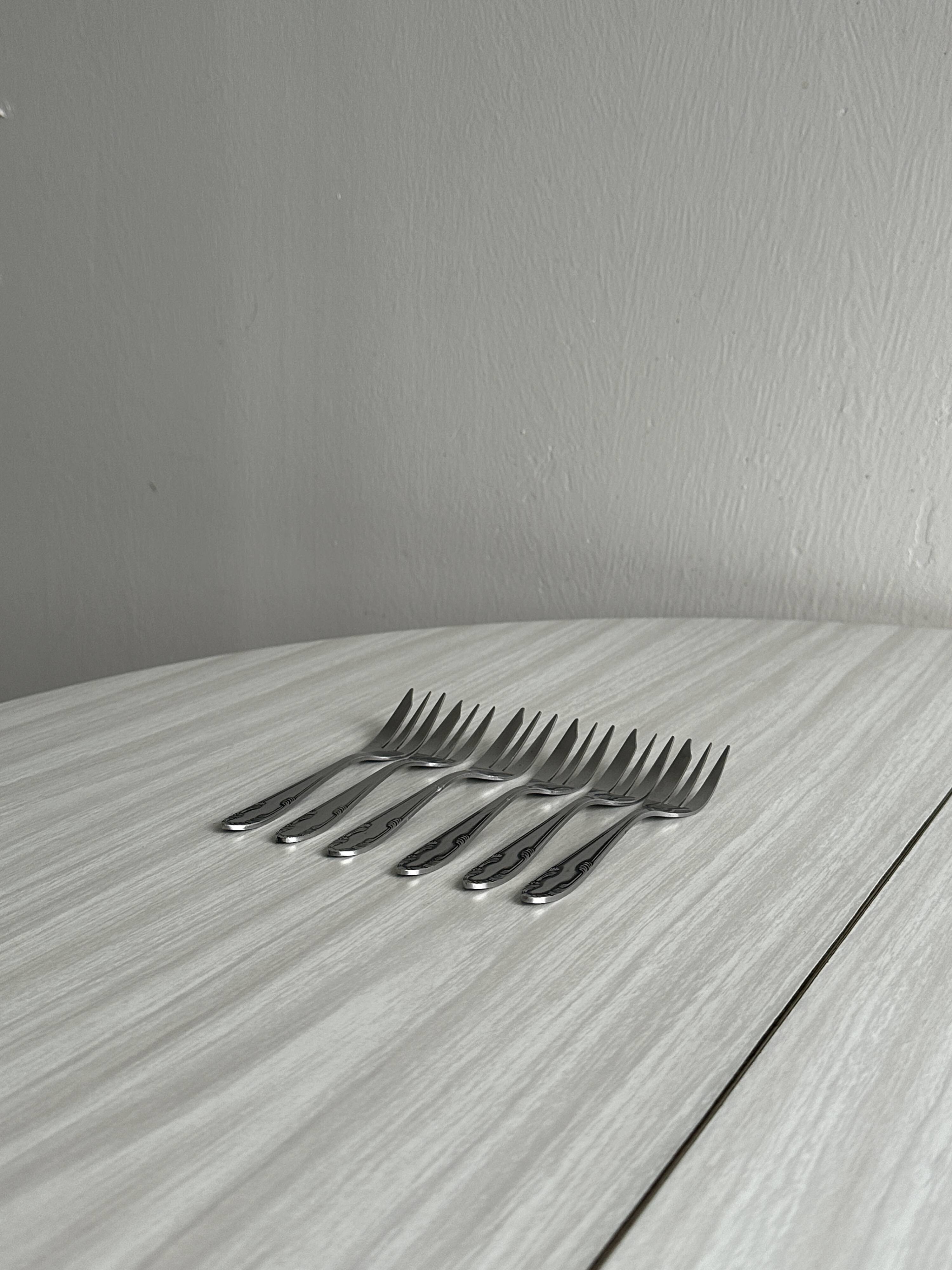 6 small silver plated metal dessert forks