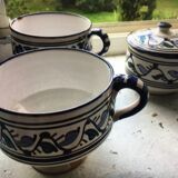 Two cups and a sugar bowl