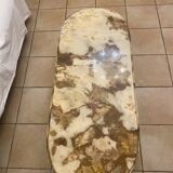 Coffee table with brass legs and marble top
