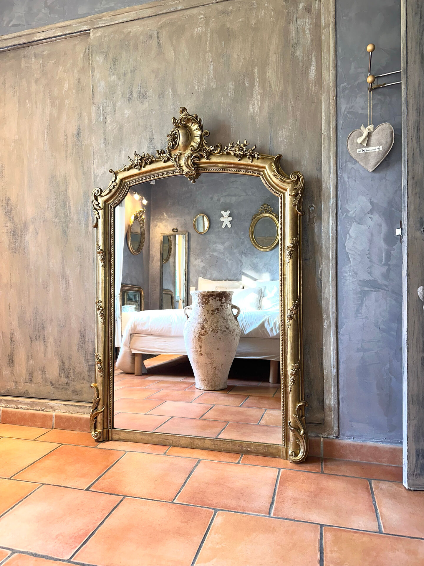 19th-century gilded antique pediment mirror