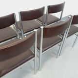 Set of 6 vintage chairs from the 70s in chrome metal and brown faux leather.