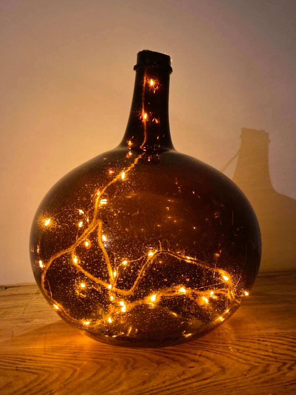 Old amber demijohn