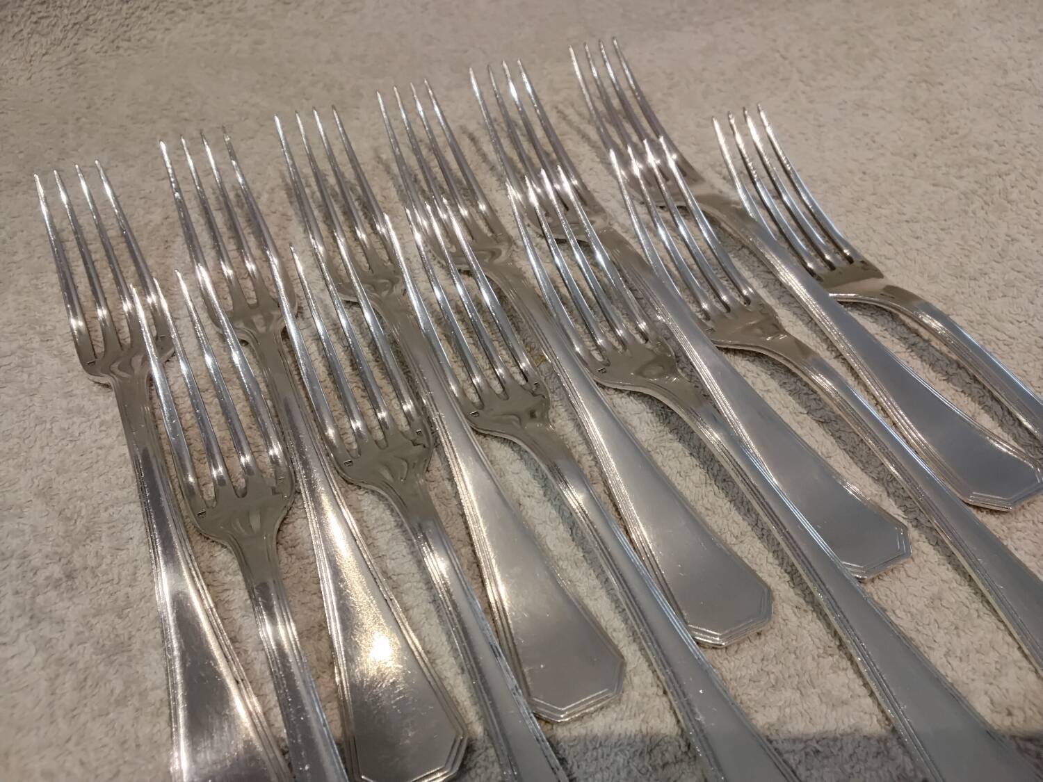 12 silver-plated table forks by Christofle America