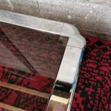 Table basse chromée et verre fumé
